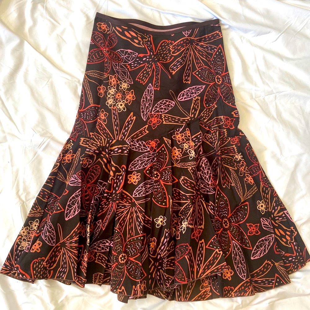 Margaret Oleary designed ruffled skirt with asymmetric front cut